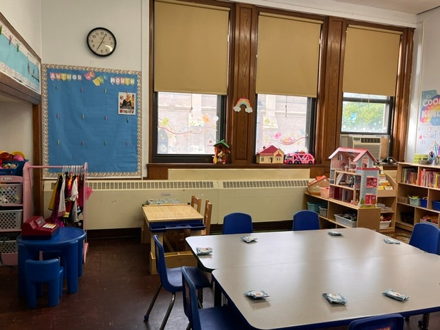 Curé of Ars classroom with Author of the Month bulletin board