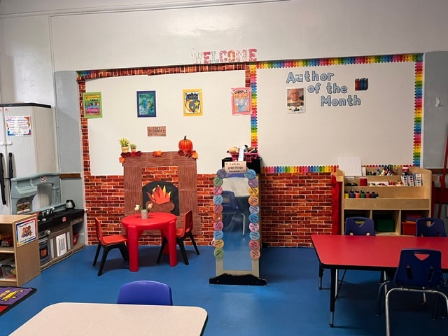 Curé of Ars classroom with fireplace reading nook