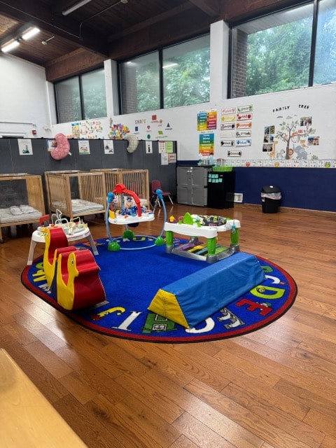 Merrick daycare classroom with play equipment