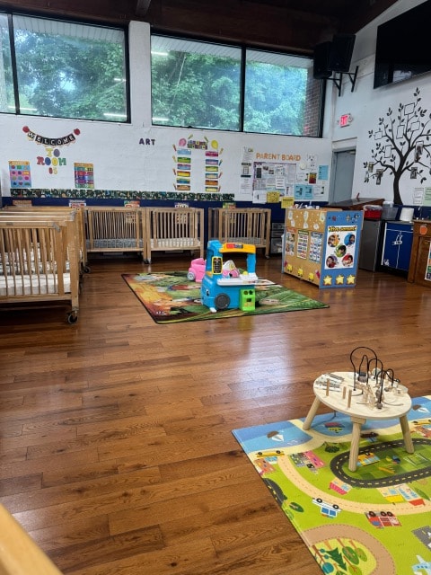 Merrick preschool classroom with learning rug