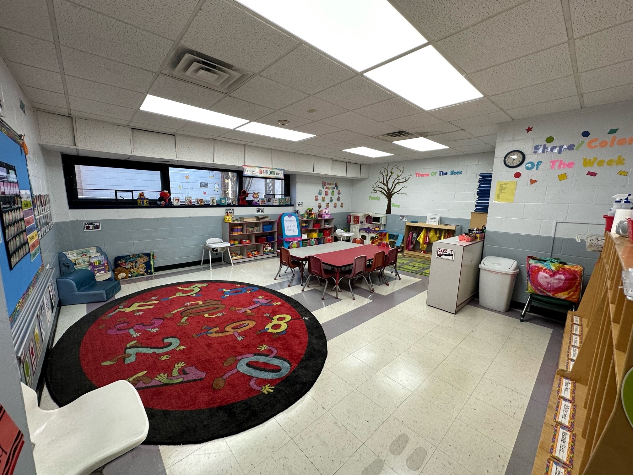 Merrick preschool classroom with colorful learning rug